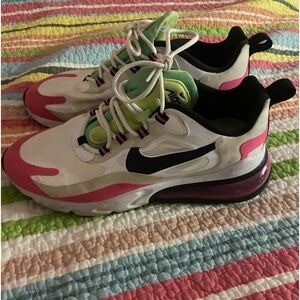 Neon pink and green Nike shoes